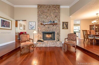 EXQUISITE WOOD BURNING STONE FIREPLACE