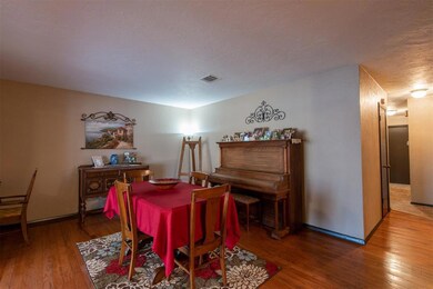 Dining area featuring wood-type flooring