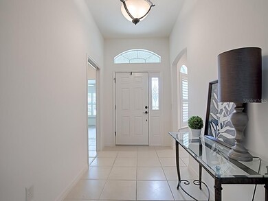 LARGE CERAMIC TILE IN FOYER, HALLWAY TO GUEST ROOM