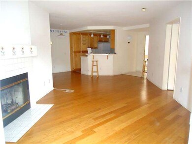 Fireplace in the living room facing towards the ki