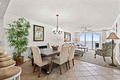 Dining room featuring a water view, ornamental mol