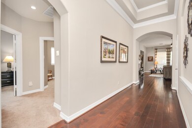 This view is from the foyer. Straight is the family room. To the left are two bedrooms, a flex area for computer work, and a bath.