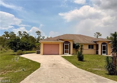 1223 E 12th St, Lehigh Acres, FL 33972 - photo 2