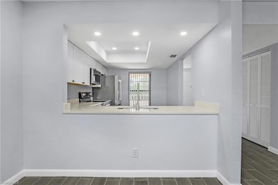 Kitchen features White Cabinetry, Stainless Steel 