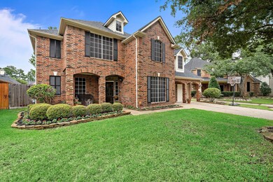 Mature landscaping with full sprinkler system.