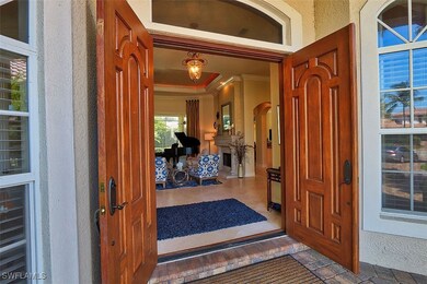 Doorway to property featuring stucco siding