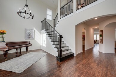 Beautiful entryway with custom staircase
