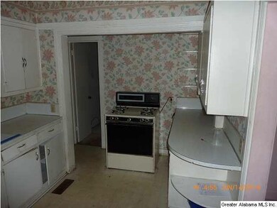 Kitchen with More Cabinets on Other Side and Gas S