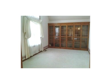 STUNNING BUILT IN LIBRARY CABINETRY IN FORMAL LIVI