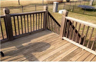 Deck overlooking backyard.