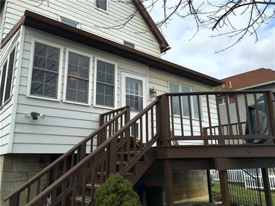 Rear Deck entering into the enclosed porch!