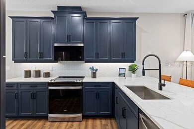 2560 Chickasaw Plum Loop, Clermont, FL 34711 - photo 3