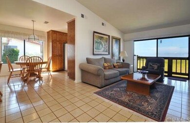 Kitchen opens to large breakfast nook and family r