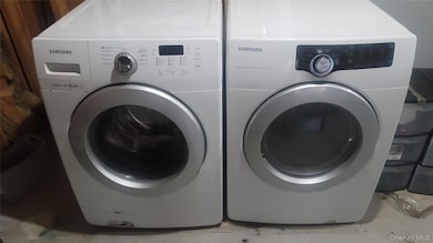 Laundry room with separate washer and dryer