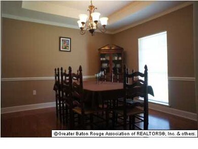 FORMAL DINING WITH WOOD FLOORS