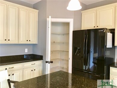 large, deep pantry for even more exceptional kitchen storage....all appliances remain and dishwasher is only a few months old