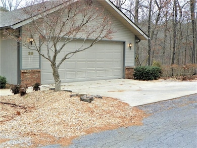 A level driveway is hard to find! And, a very wide true 2-car garage.
