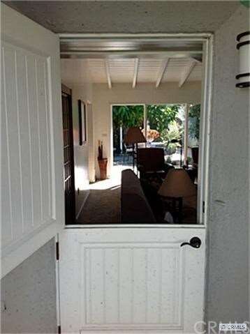 Dutch door pens to the living room.