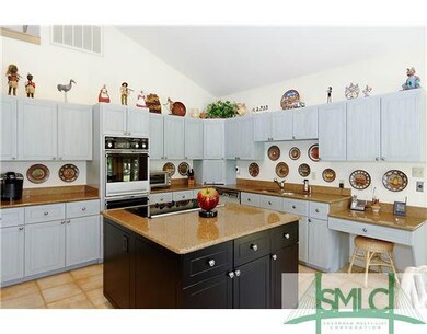 Kitchen. This spacious Kitchen looks down to the F