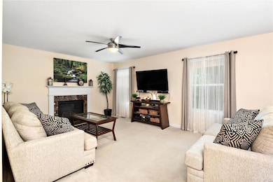 Great room with gas fireplace & a view to the back