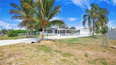 View of yard with a sunroom, fence private yard, a