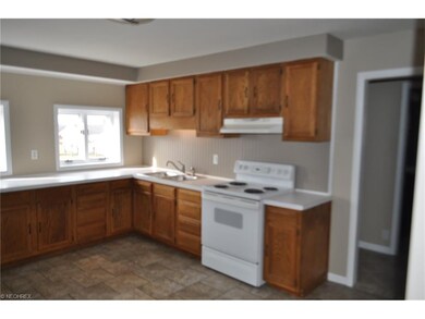 Newly tiled floors, backsplash and paint