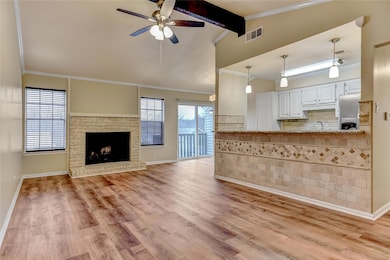 Unfurnished living room featuring visible vents, l