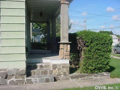 Exterior Front. Front Porch with stone accents.