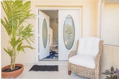 Screened front entry courtyards