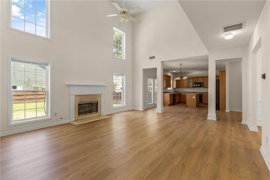 Large Fireside Living Room With Soaring Ceilings!