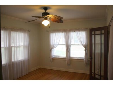 Bedroom. Full of windows with the bright sunlight 