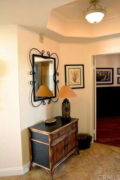 Gracious entry with travertine floor.