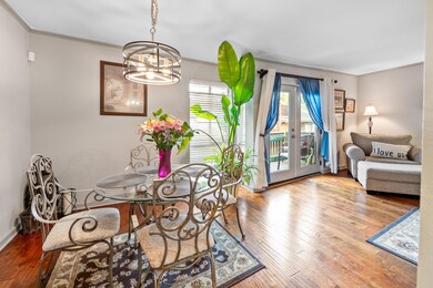 Dining area with an inviting chandelier, ornamenta
