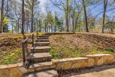 View of yard with stairway and fence
