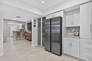 Undermount lighting and pull outs throughout the kitchen