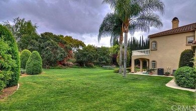 Lush green landscaping makes this home feel like a