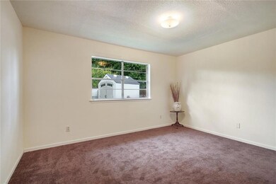 Spacious Master Bedroom has brand new carpeting.