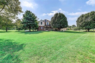 House sits on a large, corner lot