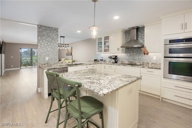 Kitchen with light hardwood / wood-style floors, w