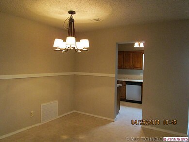 Dining Area with new lighting, crown molding and T