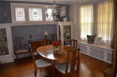 Built in cabinets, stained glass windows and the b