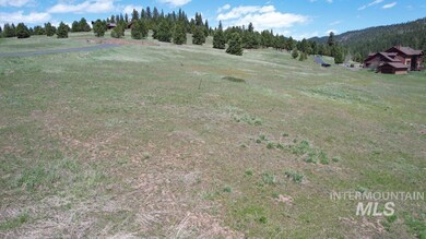 View of yard featuring a view of rural / pastoral area and a forest view