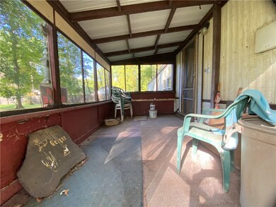 ENCLOSED FRONT PORCH