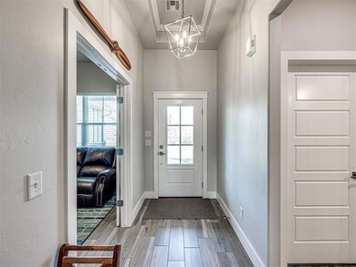 Entry with study/office ton the left, 4th bedroom 