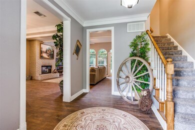 The study/den is to the right of this staircase.