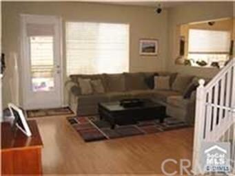 Neutral decor and beautiful flooring are part of t