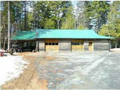 Two bay garage with metal roofing,...