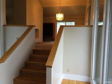 Steps leading to the upper level-kitchen, dining a