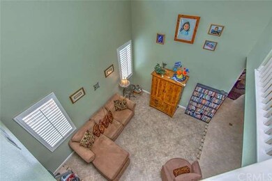 with cathedral ceiling as you walk in the living r