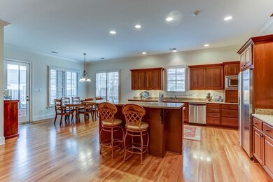 Stainless steel appliances include 5-burner gas co